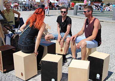 Folks playing Pisch Percussion on a sunny day in Slovankia